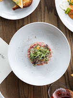 A small plated dish on the dining table