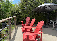 Red chairs on the café terrace