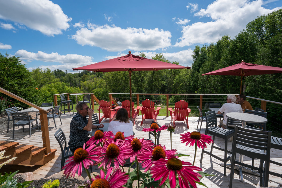 Sunny café terrace overlooking the river