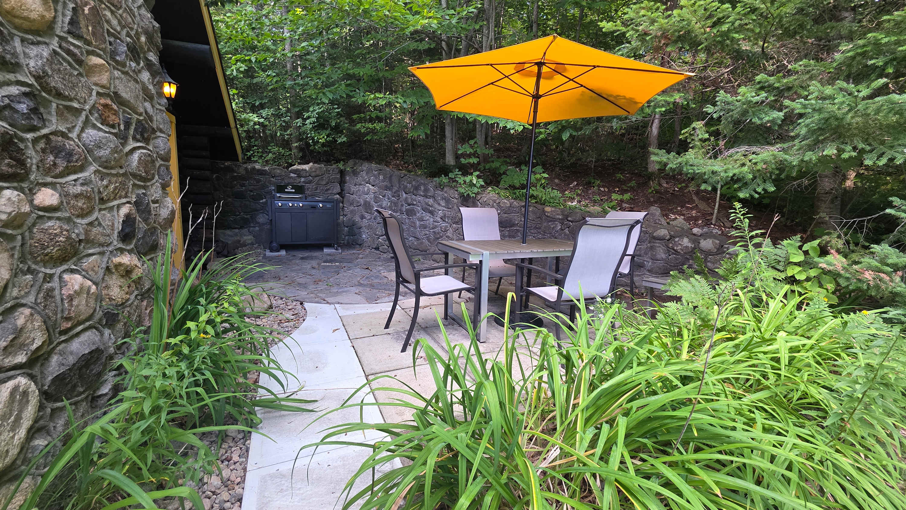 Le Refuge’s leafy outdoor terrace